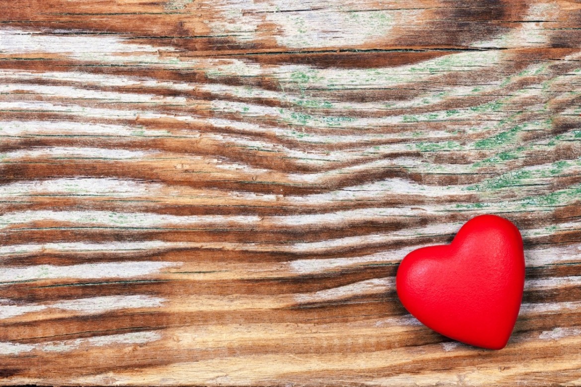 red-heart-on-grunge-wooden-background-SBI-300878631-1.jpg